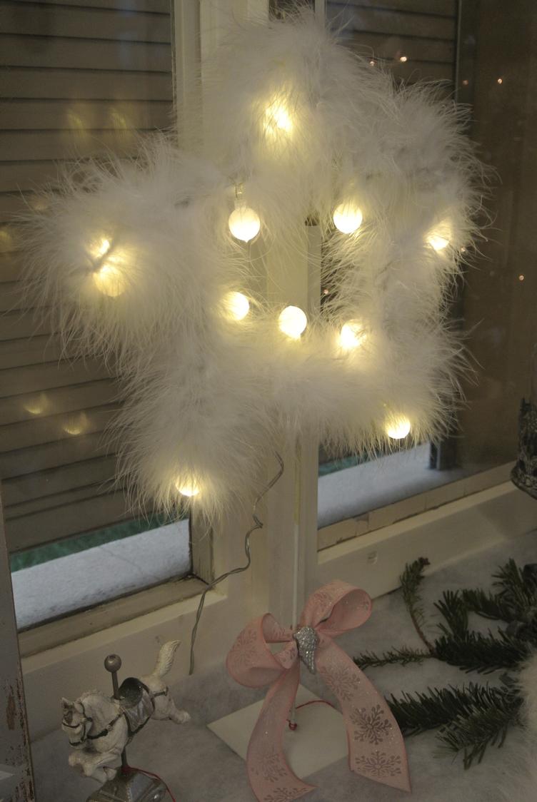 Weihnachtsstern mit Federn un LED